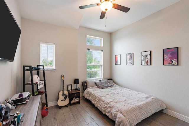 512 Bell Boot Pass, Georgetown, TX 78626 - bedroom with wood finished floors, baseboards, and a ceiling fan