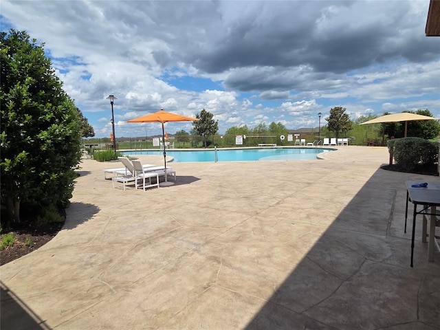 512 Bell Boot Pass, Georgetown, TX 78626 - community pool featuring fence and a patio