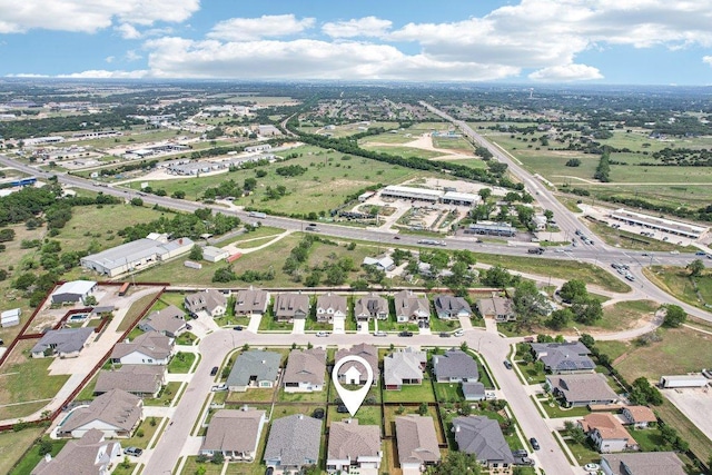 aerial overview of property's location featuring nearby suburban area