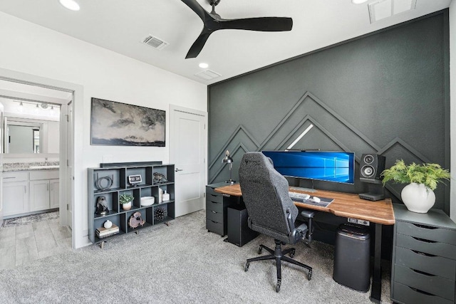 office space with a sink and a ceiling fan