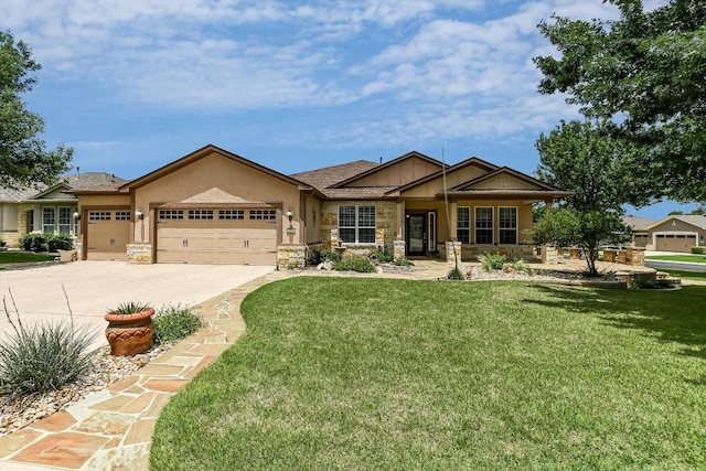 214 Yellow Rose Trl SE, Georgetown, TX 78633 - view of front of house featuring stone siding, an attached garage, and a front lawn