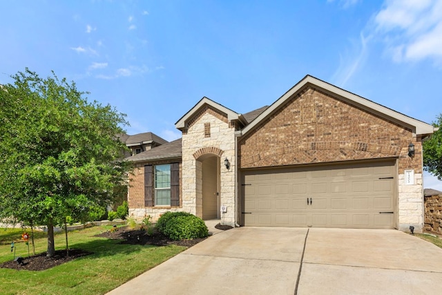 view of front facade with stone siding, concrete driveway, a garage, a front lawn, and brick siding