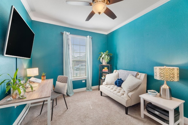 office space featuring ornamental molding, ceiling fan, carpet floors, and baseboards