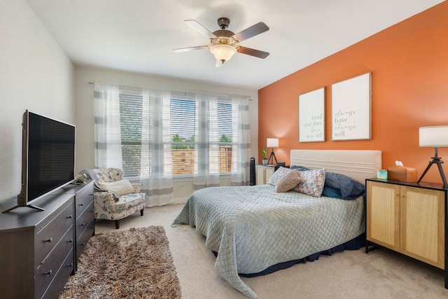 bedroom with carpet flooring and a ceiling fan