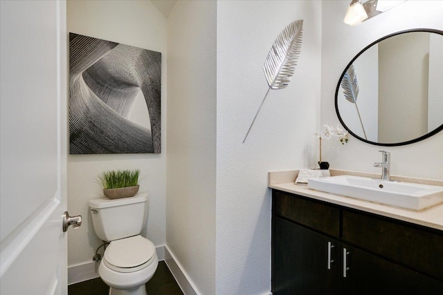 4608 Windy Brook Dr Unit B, Austin, TX 78723 - bathroom featuring toilet, vanity, and baseboards