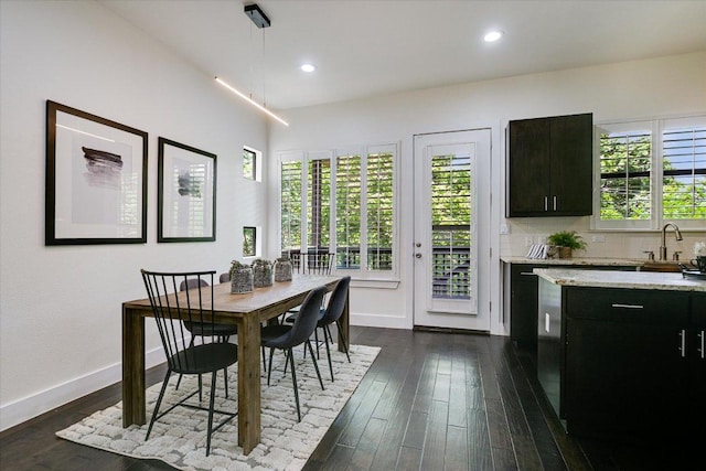 4608 Windy Brook Dr Unit B, Austin, TX 78723 - dining space featuring baseboards, dark wood-style floors, and recessed lighting