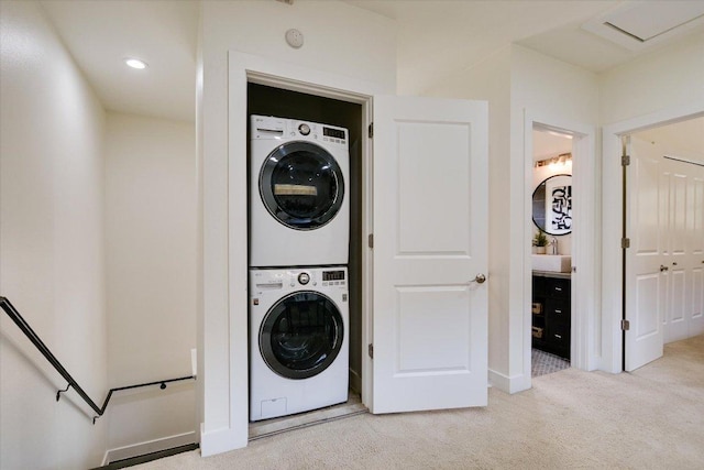 4608 Windy Brook Dr Unit B, Austin, TX 78723 - laundry area with stacked washer / drying machine, light colored carpet, and recessed lighting