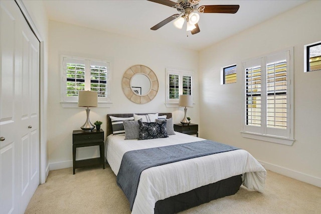 4608 Windy Brook Dr Unit B, Austin, TX 78723 - bedroom featuring carpet, a closet, and ceiling fan