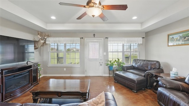 310 Hatter Dr, Moody, TX 76557 - living room featuring a raised ceiling, tile patterned floors, a ceiling fan, baseboards, and recessed lighting