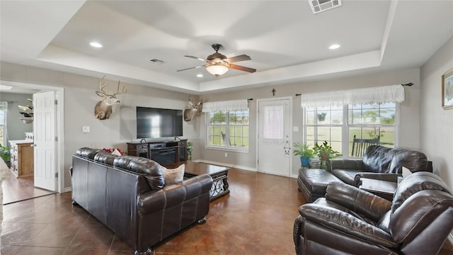 310 Hatter Dr, Moody, TX 76557 - living area featuring a tray ceiling, ceiling fan, recessed lighting, baseboards, and dark tile patterned floors