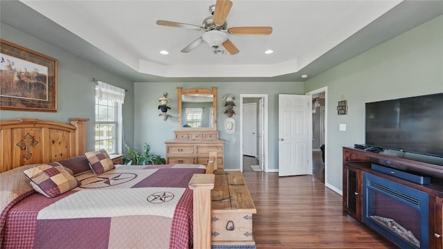 310 Hatter Dr, Moody, TX 76557 - bedroom with wood finished floors, recessed lighting, a raised ceiling, baseboards, and a ceiling fan