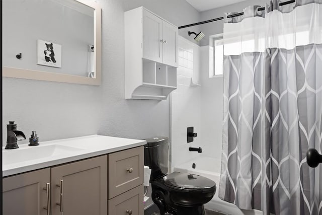 407 Osman Dr, Killeen, TX 76542 - bathroom with vanity, shower / tub combo, a textured wall, and toilet
