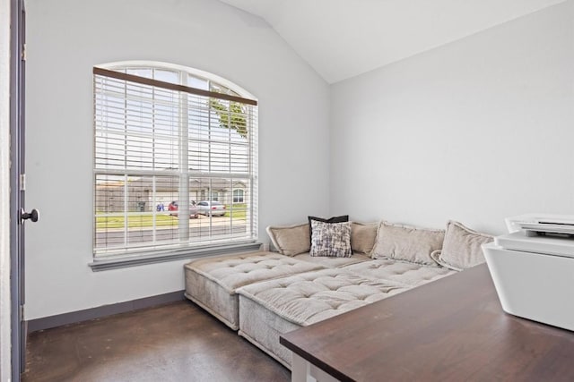 407 Osman Dr, Killeen, TX 76542 - living area featuring lofted ceiling, baseboards, and concrete flooring