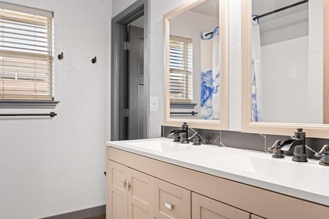 407 Osman Dr, Killeen, TX 76542 - bathroom with plenty of natural light and double vanity
