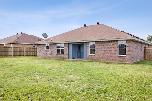 407 Osman Dr, Killeen, TX 76542 - rear view of house with brick siding and roof with shingles