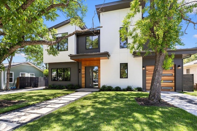 5409 Ave G Ave, Austin, TX 78751 - contemporary home featuring stucco siding and a garage