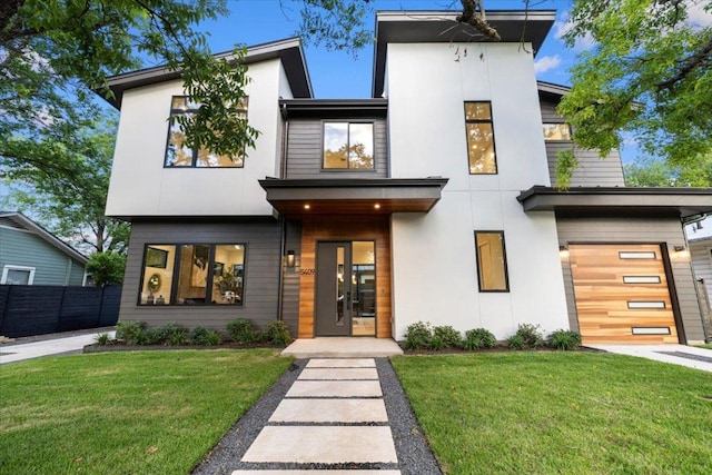 5409 Ave G Ave, Austin, TX 78751 - contemporary home featuring stucco siding and a garage