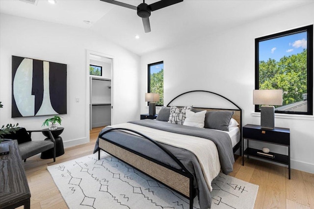 5409 Ave G Ave, Austin, TX 78751 - bedroom featuring lofted ceiling, light wood finished floors, baseboards, ceiling fan, and recessed lighting