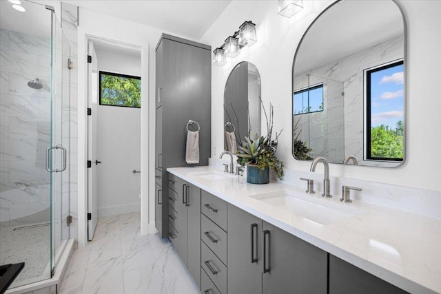 5409 Ave G Ave, Austin, TX 78751 - full bathroom with healthy amount of natural light, marble finish floors, double vanity, and a marble finish shower