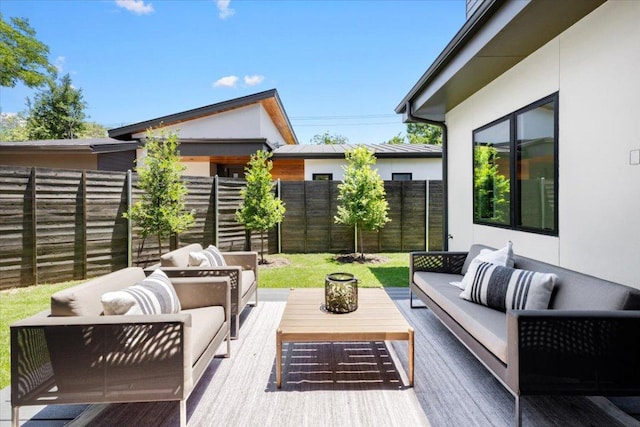 5409 Ave G Ave, Austin, TX 78751 - wooden deck featuring an outdoor living space and a fenced backyard