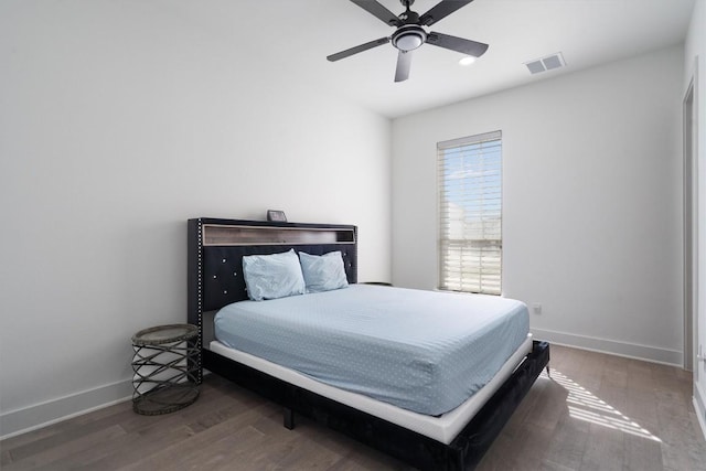 4916 Risana Bnd, Round Rock, TX 78665 - bedroom featuring wood finished floors, baseboards, and ceiling fan