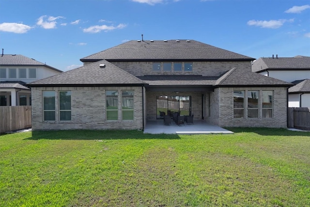 4916 Risana Bnd, Round Rock, TX 78665 - rear view of house featuring roof with shingles, a patio, and brick siding