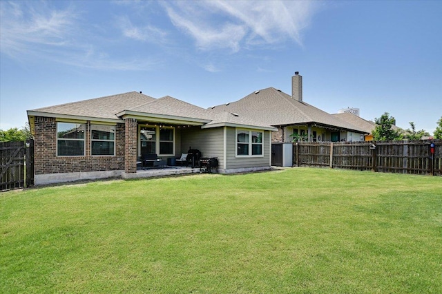 5659 Corsica Loop, Round Rock, TX 78665 - rear view of house featuring a patio, brick siding, and roof with shingles