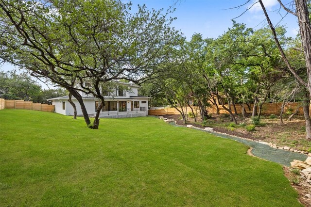 509 Lisa Dr, Austin, TX 78733 - fenced yard featuring a sunroom