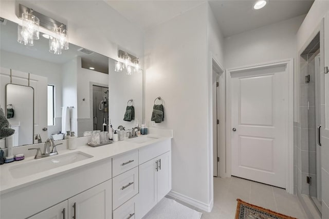 bathroom with a shower stall, tile patterned flooring, double vanity, and recessed lighting