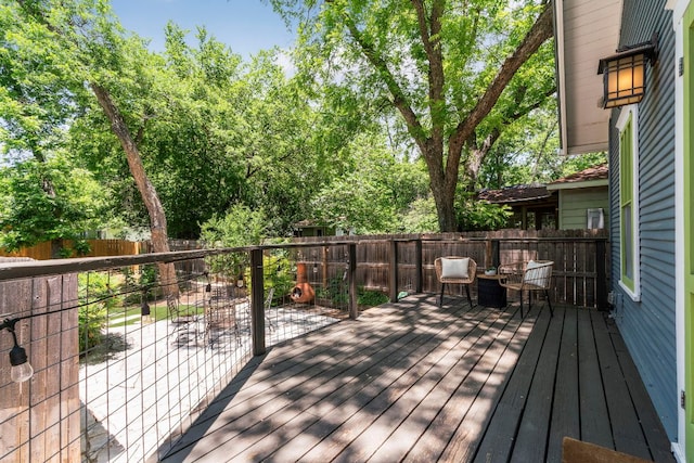4536 Duval St Unit 2, Austin, TX 78751 - wooden terrace with a fenced backyard