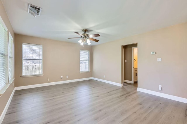 10517 S Canoa Hills Trl, Austin, TX 78717 - unfurnished room with ceiling fan, light wood-style flooring, and baseboards