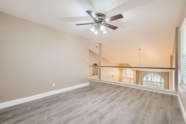 10517 S Canoa Hills Trl, Austin, TX 78717 - unfurnished living room featuring a ceiling fan, wood finished floors, and high vaulted ceiling