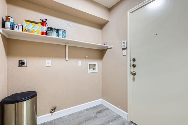 10517 S Canoa Hills Trl, Austin, TX 78717 - washroom featuring hookup for a gas dryer, washer hookup, hookup for an electric dryer, wood finished floors, and baseboards