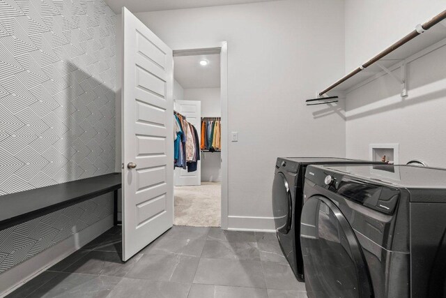124 Low River Ln, Georgetown, TX 78628 - laundry area with separate washer and dryer and carpet flooring