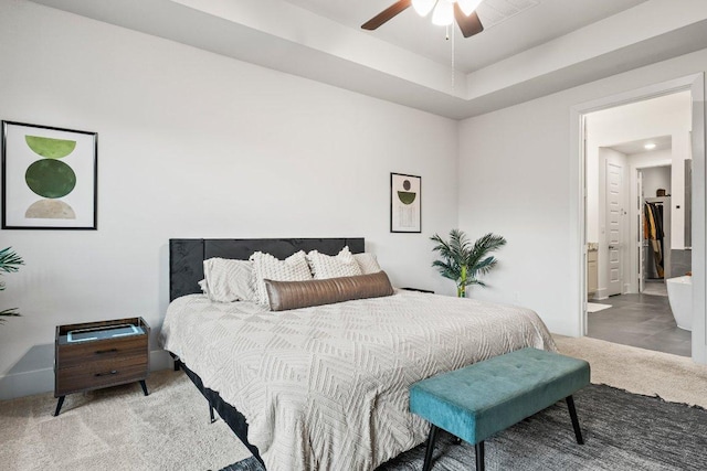 124 Low River Ln, Georgetown, TX 78628 - carpeted bedroom featuring ensuite bathroom and a ceiling fan