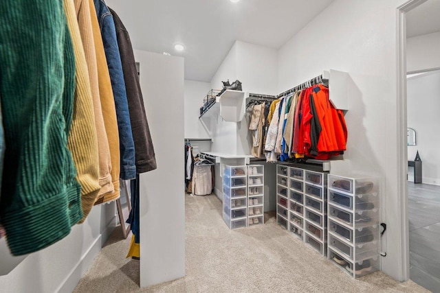 124 Low River Ln, Georgetown, TX 78628 - walk in closet featuring carpet