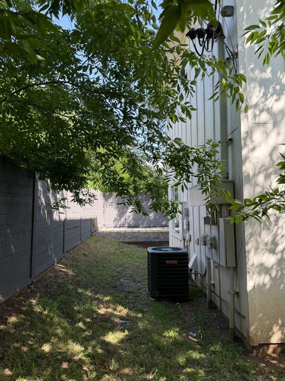 fenced backyard with central AC