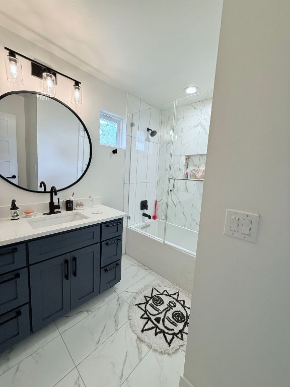 806 Philco Dr Unit 2, Austin, TX 78745 - full bath featuring vanity, marble finish flooring, and shower / bath combination