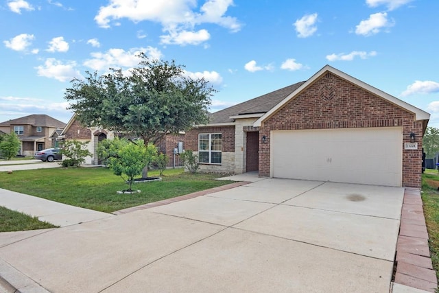 single story home featuring brick siding, a garage, a front yard, driveway, and a shingled roof