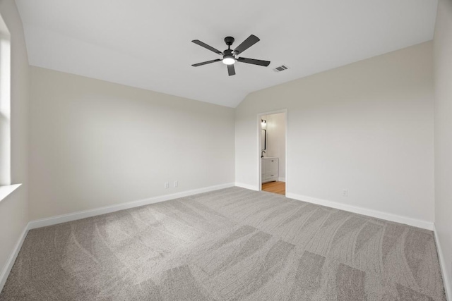13221 Cabinet Dr, Manor, TX 78653 - empty room featuring carpet floors, a ceiling fan, and lofted ceiling