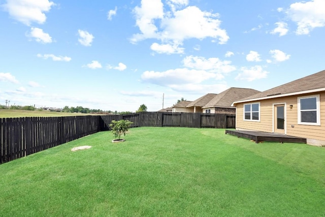 view of yard with a deck