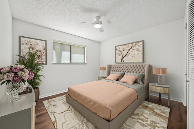 12025 Wycliff Ln, Austin, TX 78727 - bedroom featuring a textured ceiling, wood finished floors, a ceiling fan, and a closet