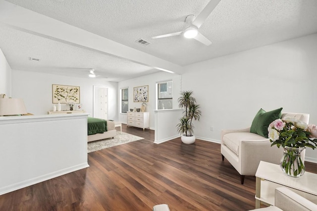 12025 Wycliff Ln, Austin, TX 78727 - sitting room featuring a ceiling fan, a textured ceiling, and wood finished floors