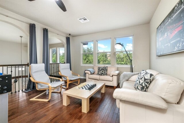402 Dry Gulch Bnd, Cedar Park, TX 78613 - living area with arched walkways, wood-type flooring, and a ceiling fan
