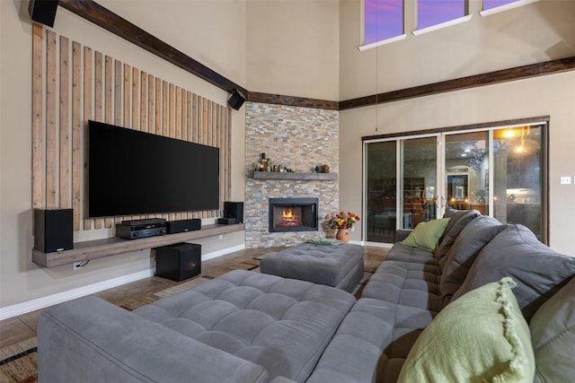 402 Dry Gulch Bnd, Cedar Park, TX 78613 - living area featuring a towering ceiling, a stone fireplace, and tile patterned floors