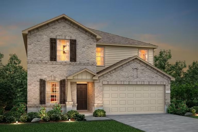 13417 Cerro Castellan Trce, Manor, TX 78653 - view of front of house with driveway, roof with shingles, an attached garage, and brick siding