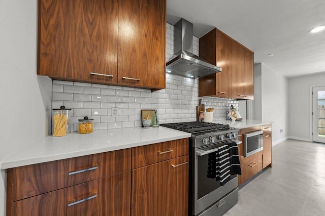 11701 Tanglebriar Trl, Austin, TX 78750 - kitchen with stainless steel appliances, wall chimney exhaust hood, tasteful backsplash, light countertops, and modern cabinets