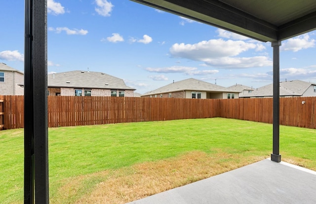 13404 Lapoynor St, Manor, TX 78653 - fenced backyard with a patio area and a residential view