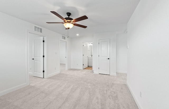 13404 Lapoynor St, Manor, TX 78653 - unfurnished bedroom with connected bathroom, light carpet, a ceiling fan, and recessed lighting