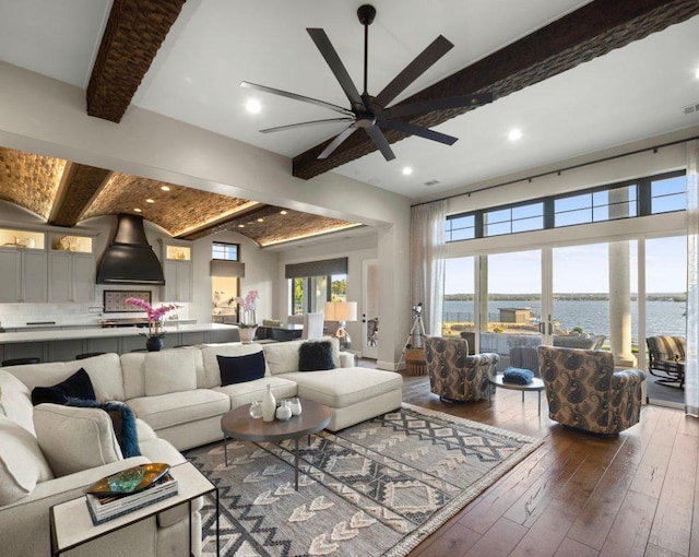 2510 Belaire E Ln, Granite Shoals, TX 78654 - living area featuring beamed ceiling, a water view, ceiling fan, hardwood / wood-style flooring, and recessed lighting
